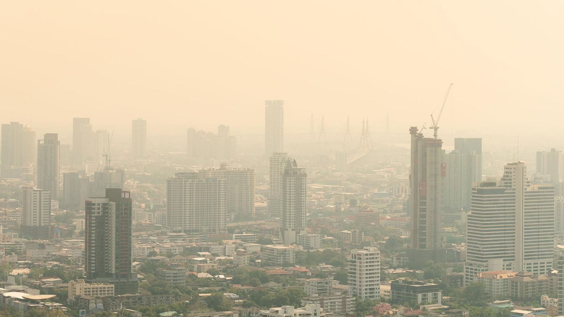 Low visibility city view with haze and fog. Credit: Sugrit 