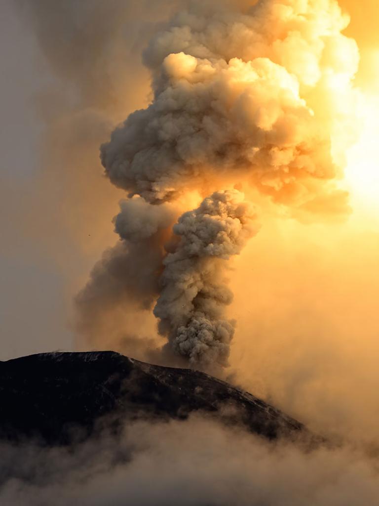 Volcanic eruption with plume. Credit: Ammit 