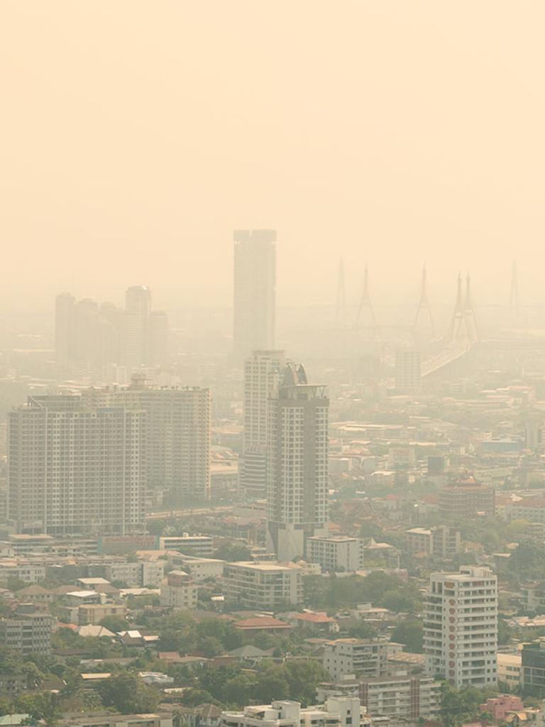 Low visibility city view with haze and fog. Credit: Sugrit 